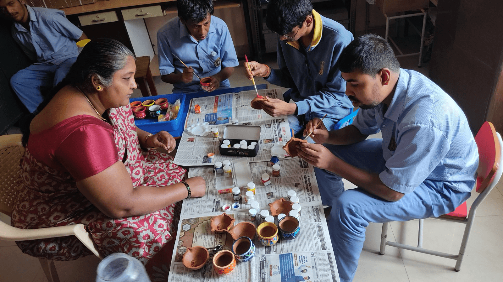 Children painting and doing crafts together